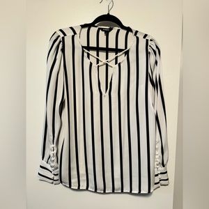Express women’s black and white striped blouse